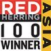 A red herring logo with the words red herring 100 winner.