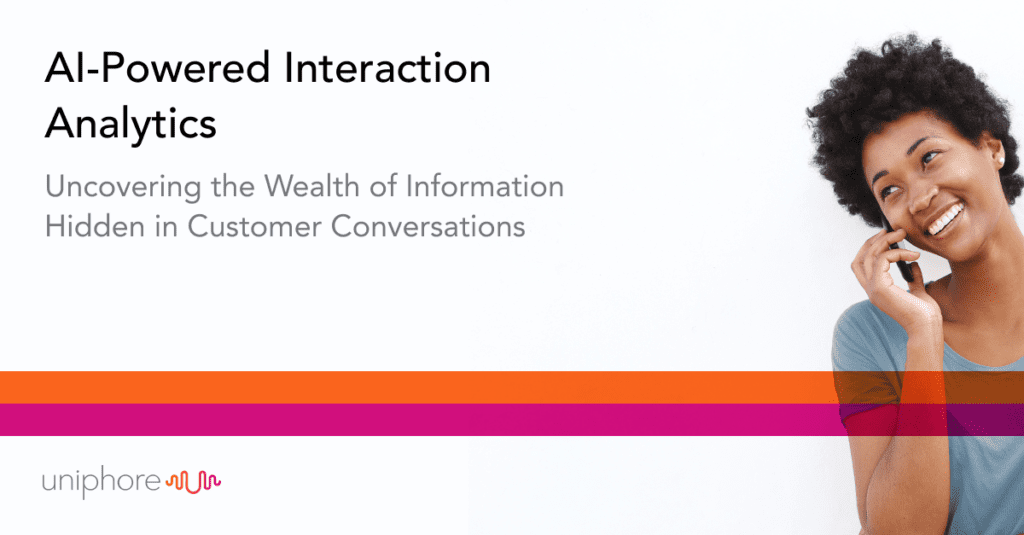A woman on a cell phone using al-powered interaction analytics to uncover the wealth of information hidden in customer conversations.