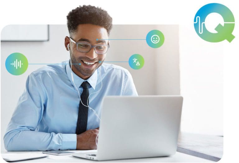 A man smiles while working on his laptop, ensuring security and privacy.