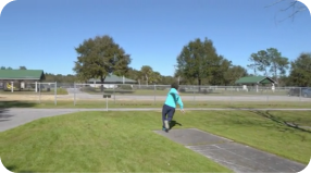 A person skateboarding down a ramp at an outdoor skate park during a Uniphore sales meeting.